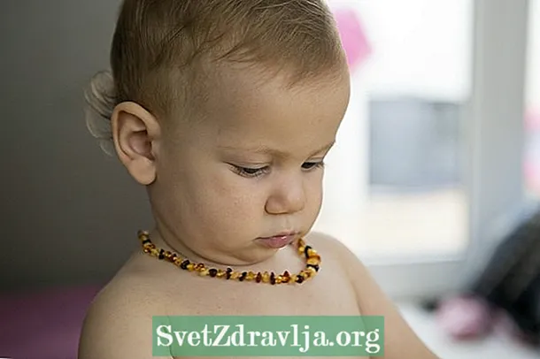 Tveganja oranžne ogrlice za dojenčka